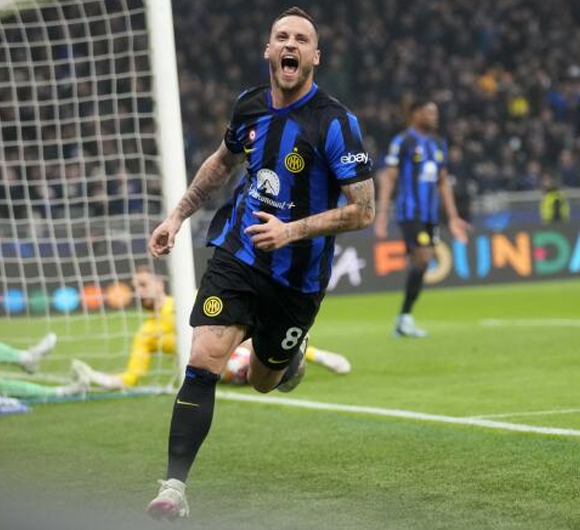 Inter Milan Secures Narrow Victory Over Atletico Madrid in Champions League Clash