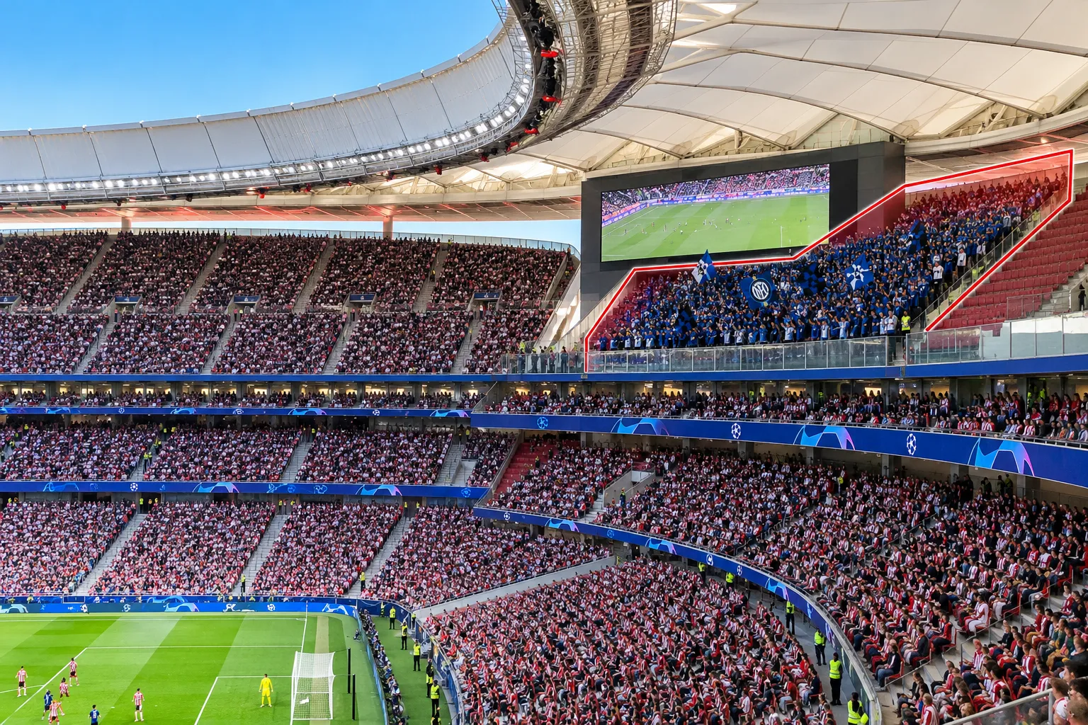 Stadium view of the away-fan section highlighted in red in the upper tier of the Metropolitano Stadium during a match.